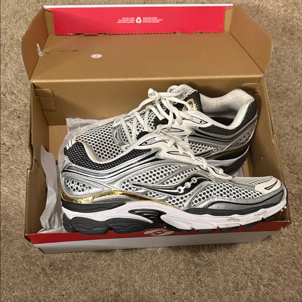 Saucony Mesh Sneakers in White, Black, and Gold